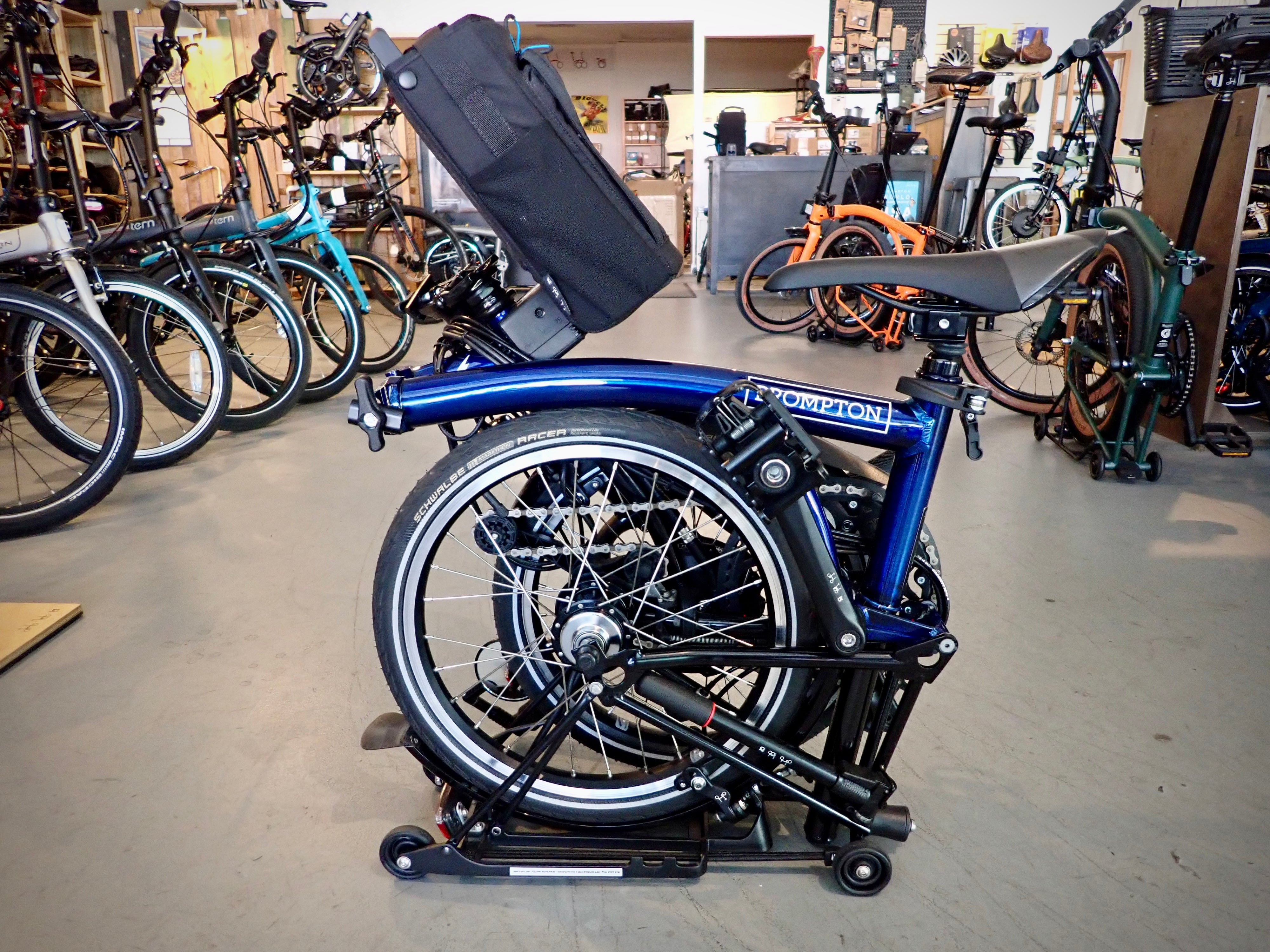 USED 2021 Brompton Electric C Line Bolt Lacquer Blue w/ Rack